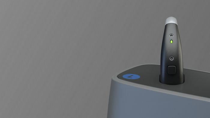 Aparelho auditivo Bluetooth recarrega bateria