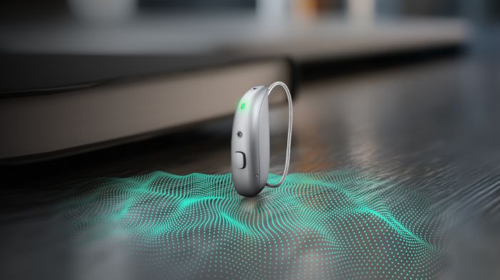 Novo Aparelho Auditivo Minisom, o ampli-mini AI em cima de uma mesa